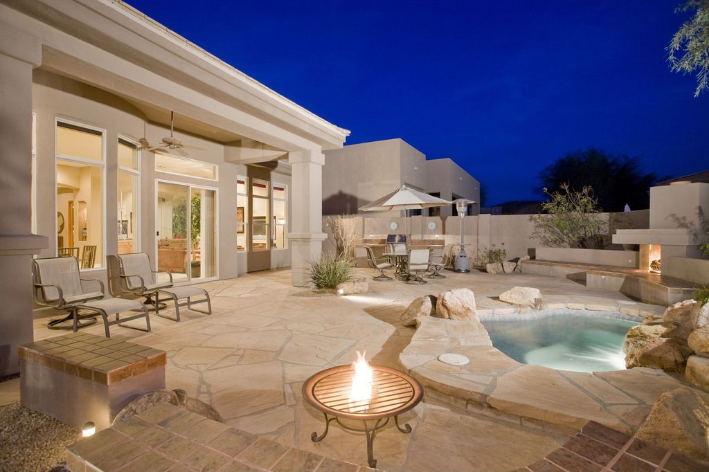 Contemporary Patio with exterior stone floors & outdoor pizza oven in