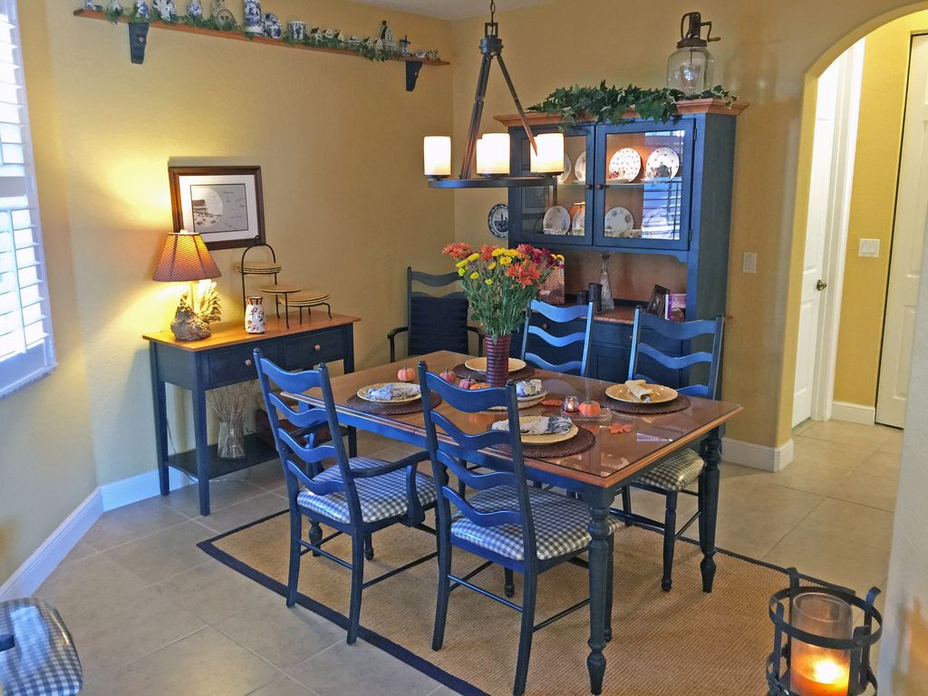 country dining room with travertine tile floors & chandelier country dining room with travertine tile floors & chandelier