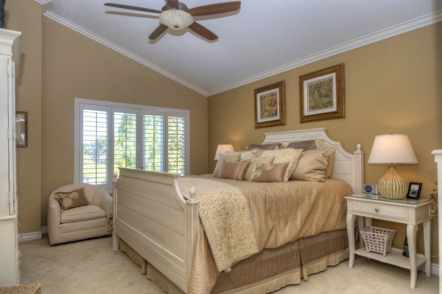 Cottage Guest Bedroom With Flush Light Ceiling Fan In Encinitas Cottage Guest Bedroom With Crown Molding Carpet Flush Light Ceiling Fan
