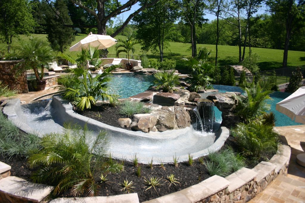 Pool Beds tropical swimming pool with exterior stone floors & raised beds Pool Beds tropical swimming pool with exterior stone floors & raised beds