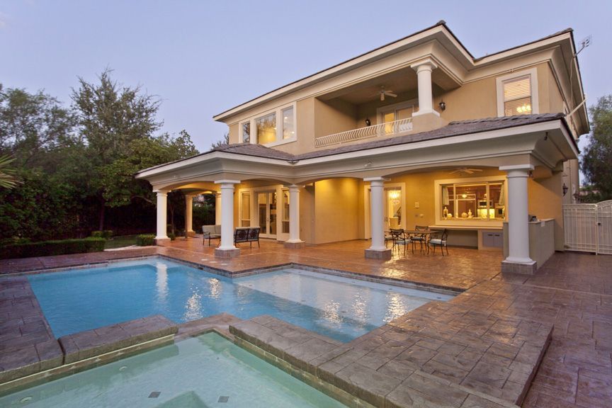 Traditional Swimming Pool with Gate & French doors in Las Vegas, NV