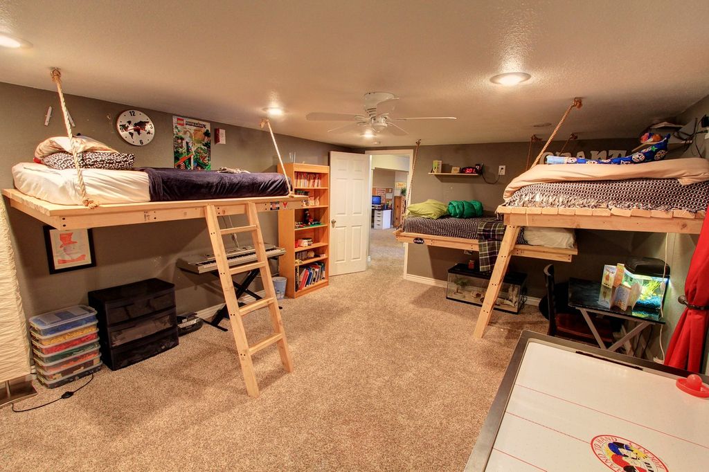 Rustic Kids Bedroom with Ceiling fan &amp; Carpet in Denver 