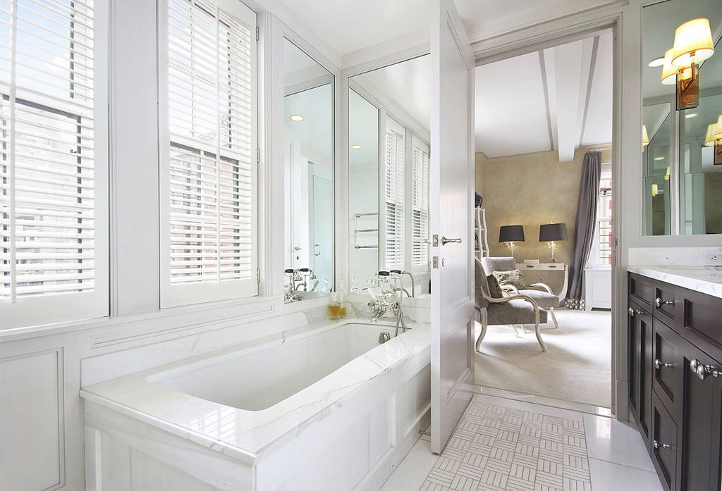 Traditional Master Bathroom with Flat panel cabinets by The Corcoran Group Zillow Digs Zillow