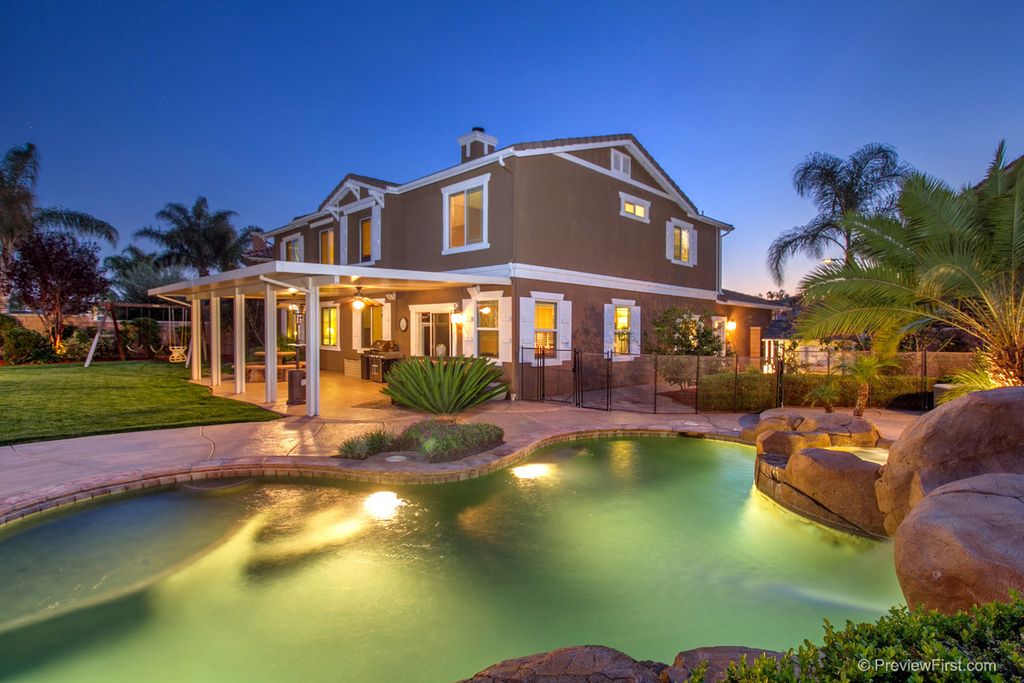Rustic Swimming Pool with Outdoor kitchen & Gate in TEMECULA, CA