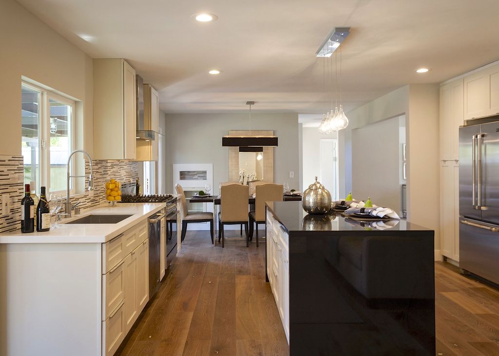 contemporary kitchen with waterfall countertop & flat panel contemporary kitchen with waterfall countertop & flat panel