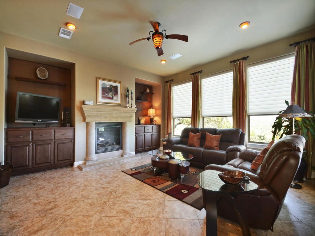 traditional living room with stone fireplace & built-in bookshelf traditional living room with stone fireplace & built-in bookshelf