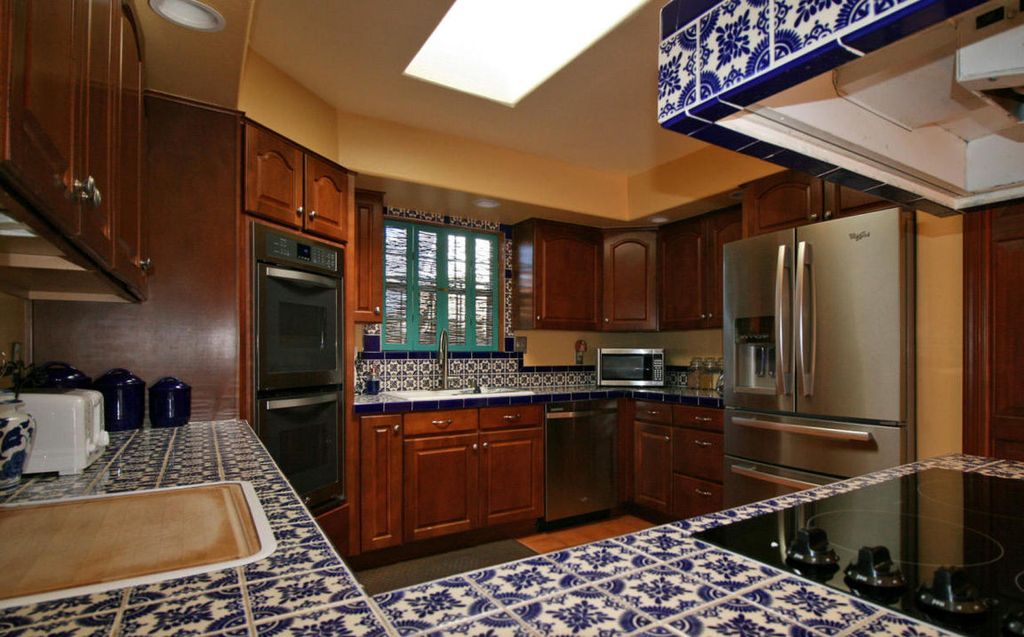 kitchen with mexican tile backsplash & u-shaped in albuquerque, nm kitchen with mexican tile backsplash & u-shaped in albuquerque, nm