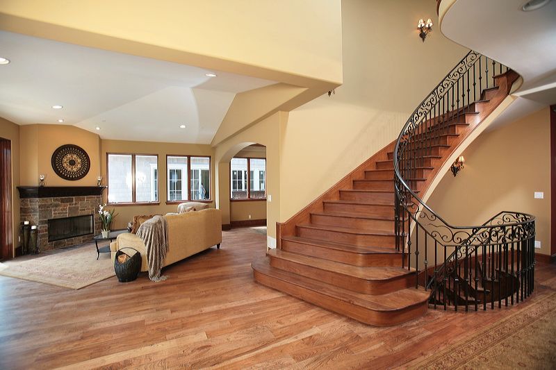 Mediterranean Staircase with Wall sconce by David White | Zillow Digs
