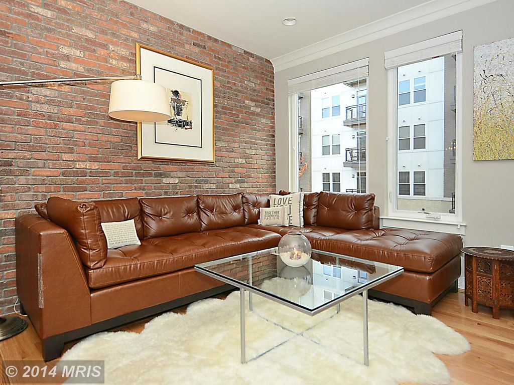 Contemporary Living Room With Interior Brick Crown Molding In