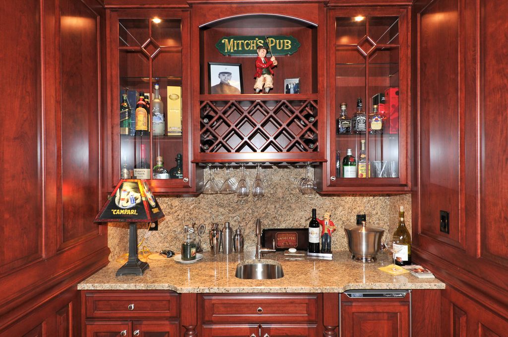 Traditional Bar with Builtin bookshelf by Walsh Team Zillow Digs