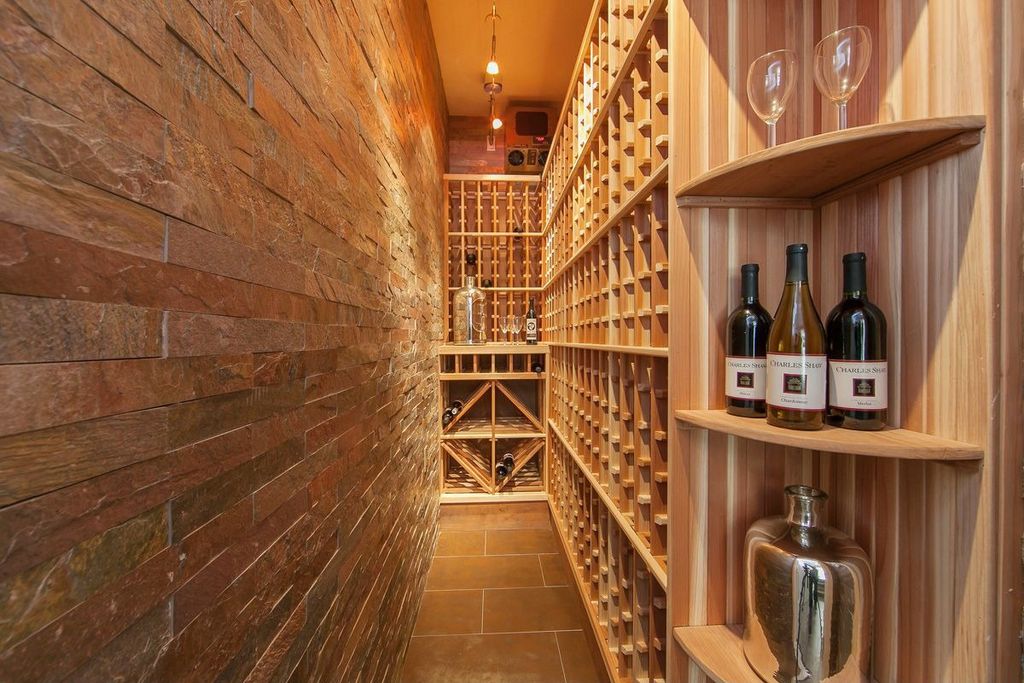 Rustic Wine Cellar with Built in wine storage & Builtin bookshelf in