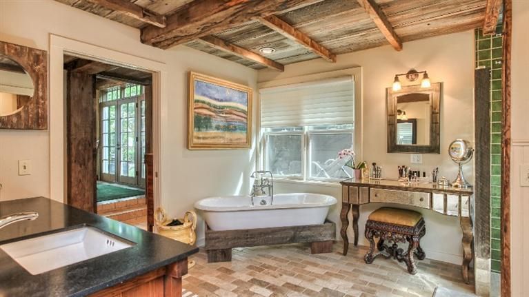 Rustic Master Bathroom Design Ideas & Pictures | Zillow Digs | Zillow  Rustic Master Bathroom with Granite Indian Premium Black Satin, Faux Wood  Panels and Planks