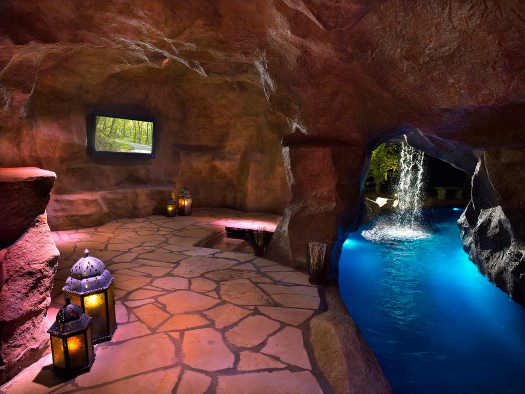 Inside Pool Cave rustic swimming pool with water feature & indoor pool | zillow Inside Pool Cave rustic swimming pool with water feature & indoor pool | zillow