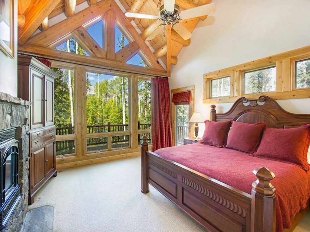 rustic master bedroom with carpet & stone fireplace | zillow digs rustic master bedroom with carpet & stone fireplace | zillow digs