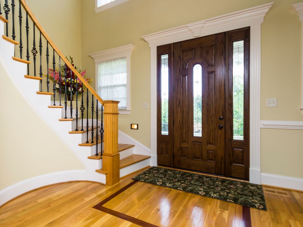 Chair Rail Entryway Part - 16: Traditional Entryway With High Ceiling, Hardwood Floors, Chair Rail, Carpet