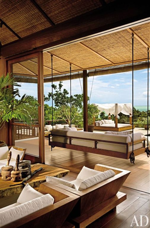 Tropical Porch with Raised beds & Porch swing Zillow Digs Zillow