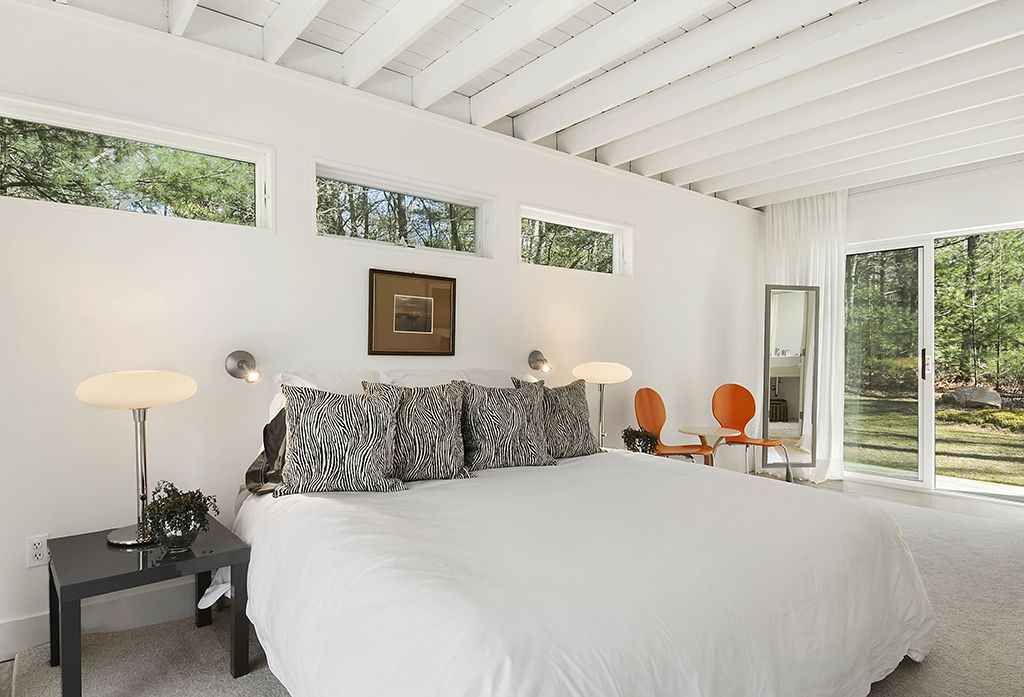 Contemporary Master Bedroom with Exposed beam by The Corcoran Group ...