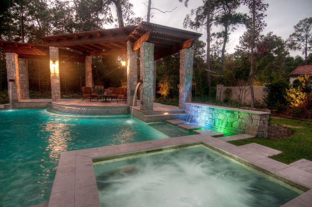 Traditional Swimming Pool with Gazebo & Waterfall feature Zillow Digs