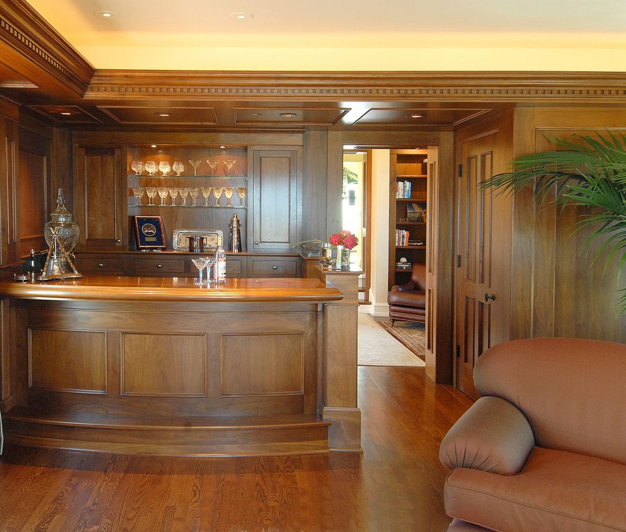 Traditional Bar with Builtin bookshelf by Sutton Suzuki Architects