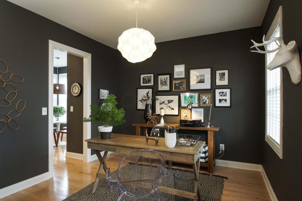 contemporary home office with pendant light & hardwood floors in contemporary home office with pendant light & hardwood floors in