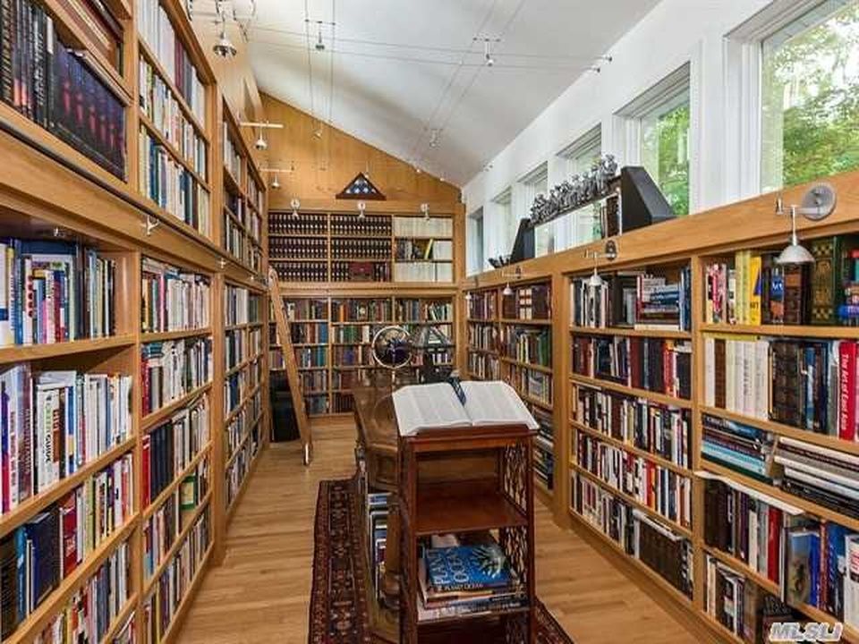 Traditional Library with High ceiling by Jackie Turner Zillow Digs