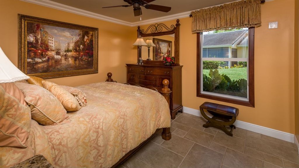 Craftsman Guest Bedroom With Crown Molding Ceiling Fan In Naples Craftsman Guest Bedroom With Ceiling Fan Travertine Tile Floors Crown Molding