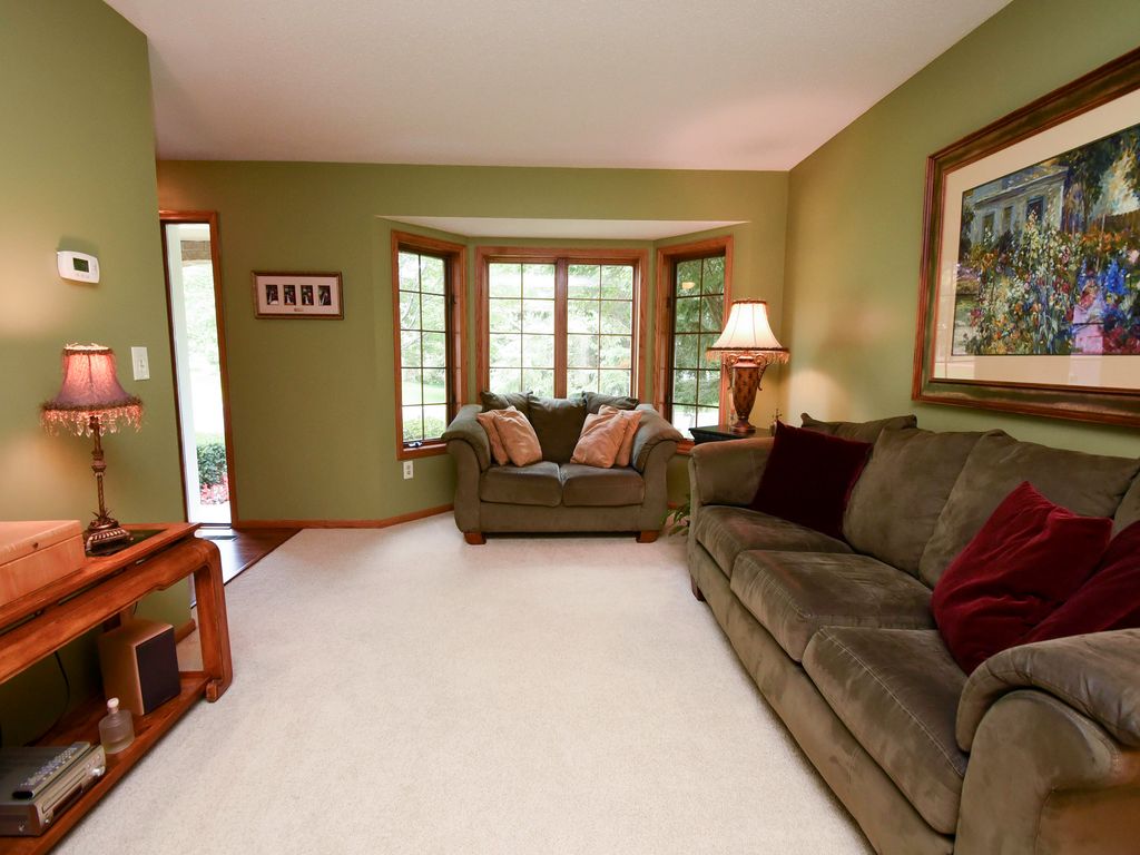 craftsman living room with carpet & hardwood floors in woodbury craftsman living room with carpet & hardwood floors in woodbury