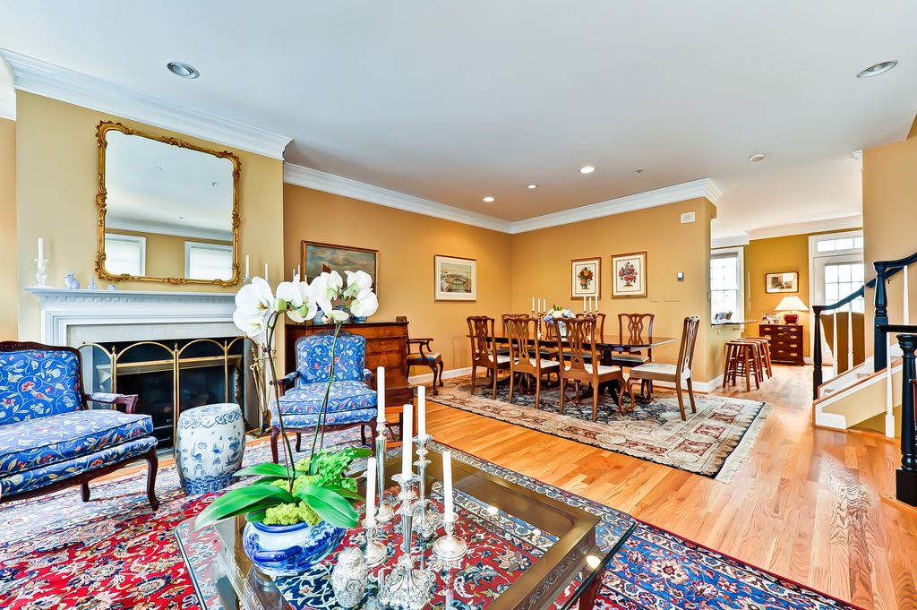 Traditional Great Room with Cement fireplace by Jessica Richardson
