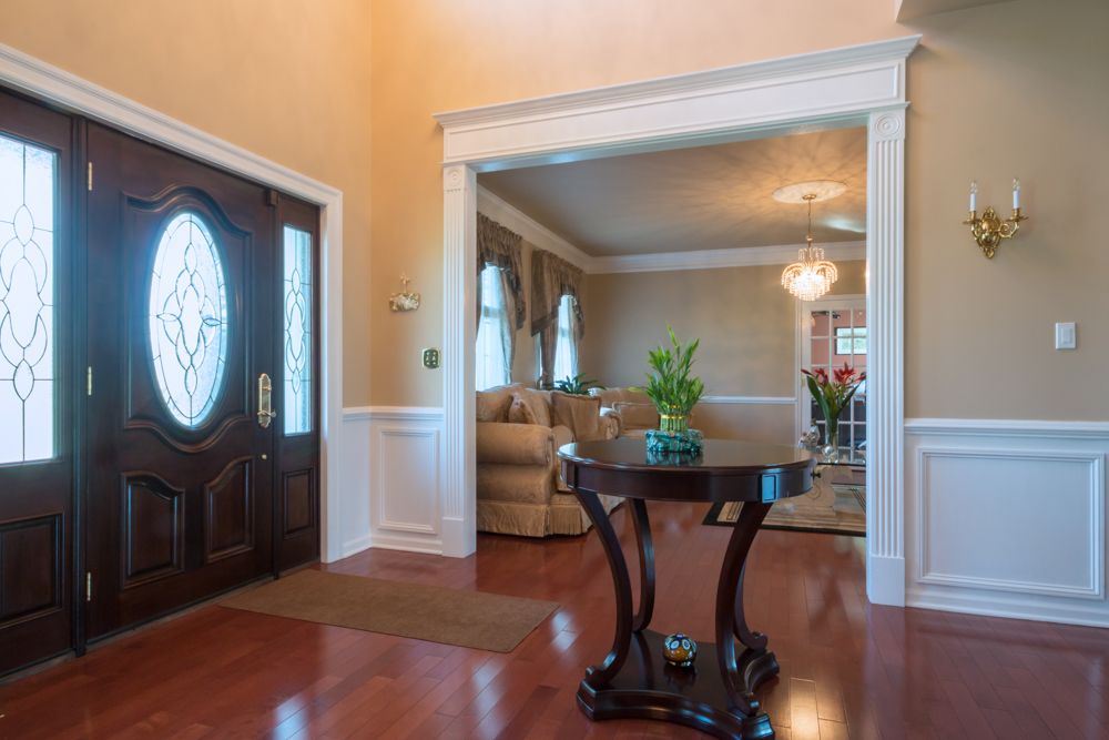 Chair Rail Entryway Part - 31: Traditional Entryway With High Ceiling, Hardwood Floors, Chair Rail, Glass Panel Door,