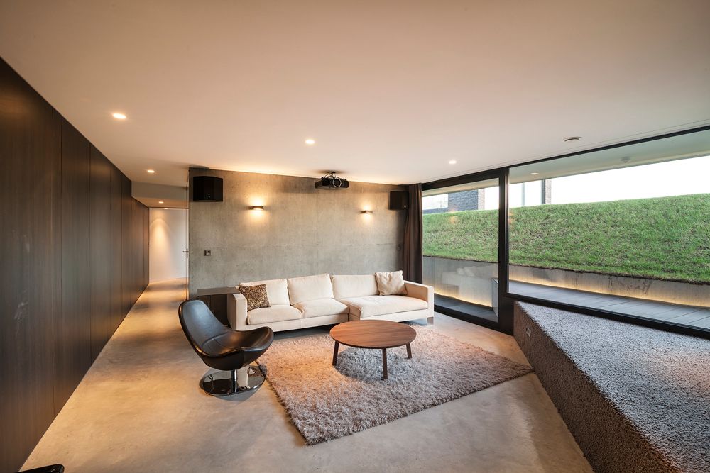Modern Living Room with Concrete wall by Home Stratosphere Zillow Digs Zillow
