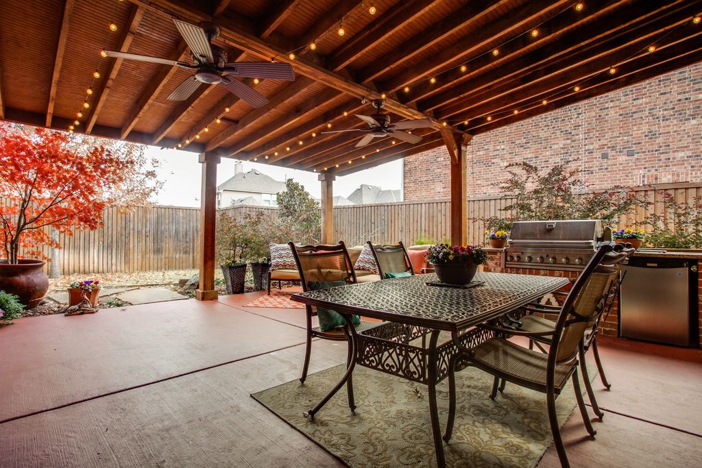 Traditional Porch with Outdoor kitchen & Wrap around porch in Frisco