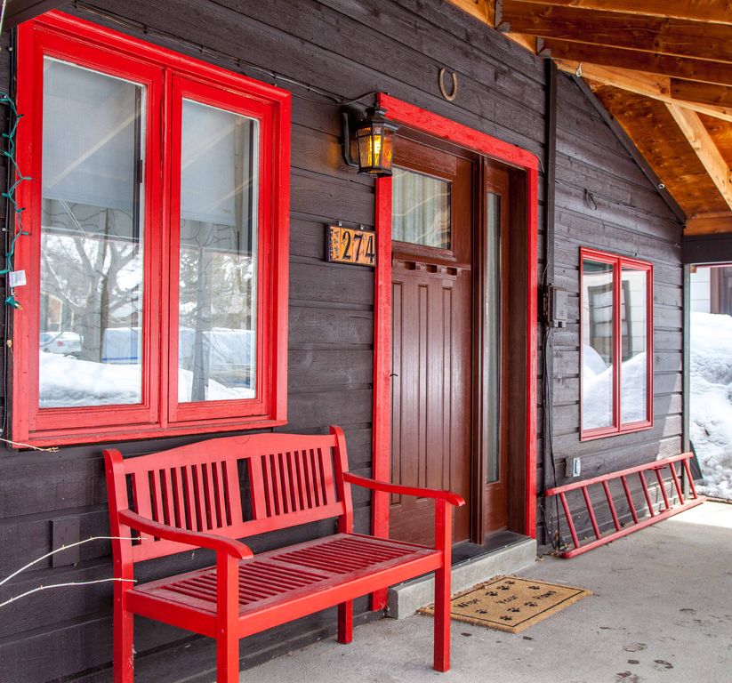 Rustic Porch with exterior stone floors & Wrap around porch in