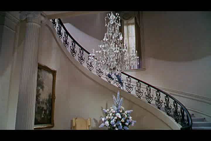 Chair Rail Staircase Part - 41: Traditional Staircase With Columns, Chandelier, Carpet, Chair Rail, Wainscoting, Cathedral Ceiling