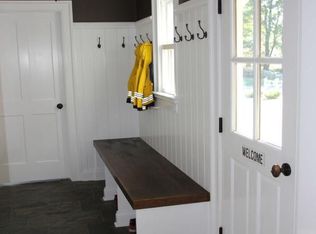 Traditional Mud Room with High ceiling & Wainscoting in Darien, CT