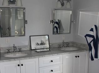 Traditional Mud Room with High ceiling & Wainscoting in Darien, CT