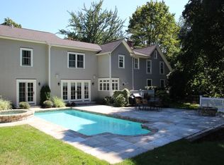 Traditional Mud Room with High ceiling & Wainscoting in Darien, CT