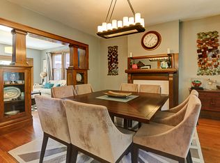 Cottage Powder Room with Wall sconce & Chair rail in ...