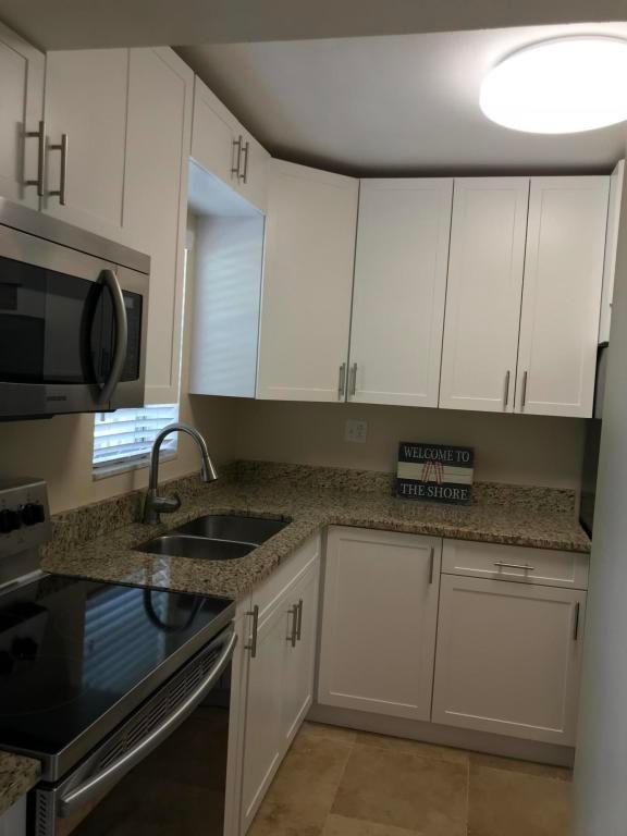 1911 SW Palm City Rd APT 6I