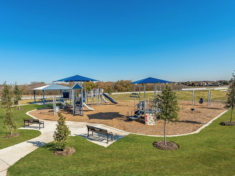 The wonderful park at Retreat at Fossil Creek has swings, slides, benches, and more!