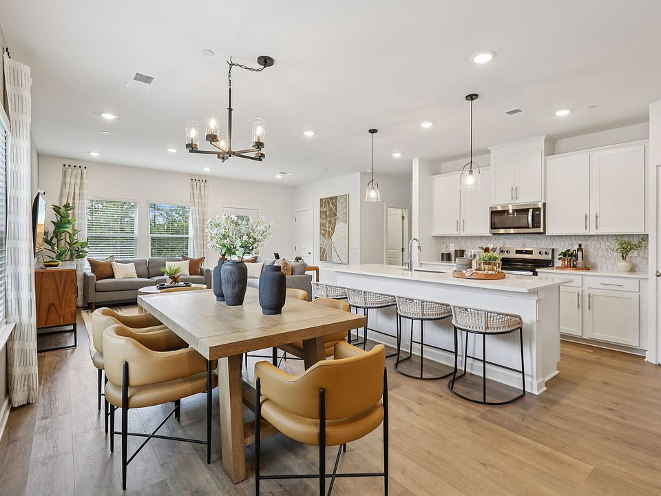 The open-concept floorplan allows for an easy flow between the kitchen and dining areas.