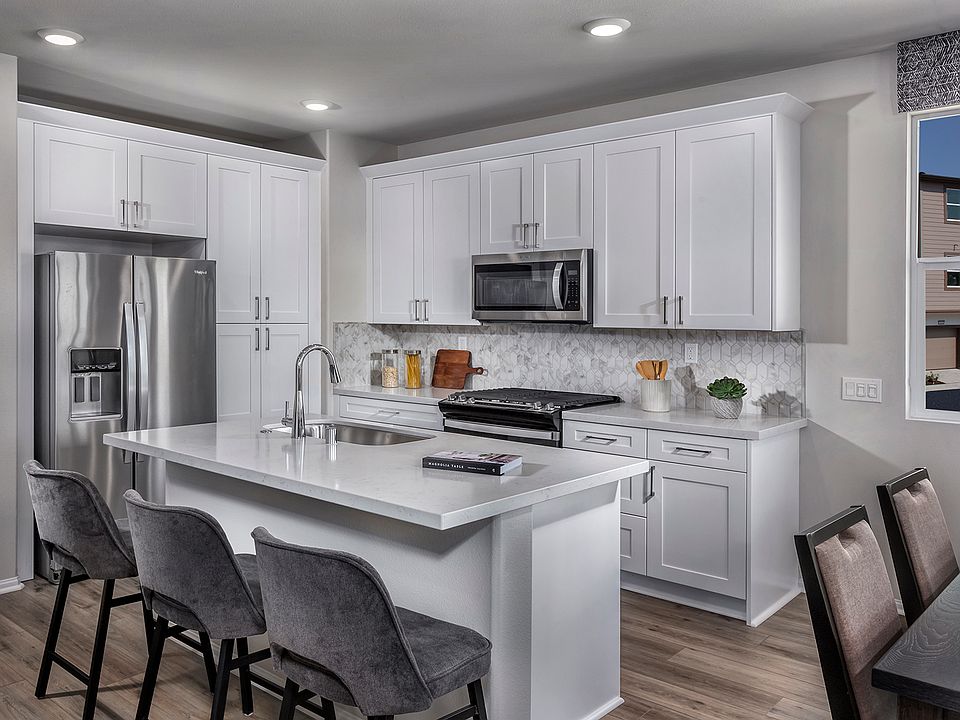 Kitchen in the 1636 floorplan at a Meritage Homes community in Pomona, CA.