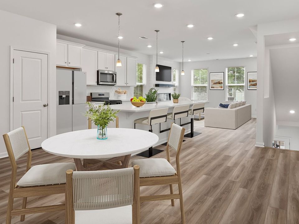 Beautiful Open-Concept Kitchen and Eat In Area of the Brookgreen at Rivers Edge