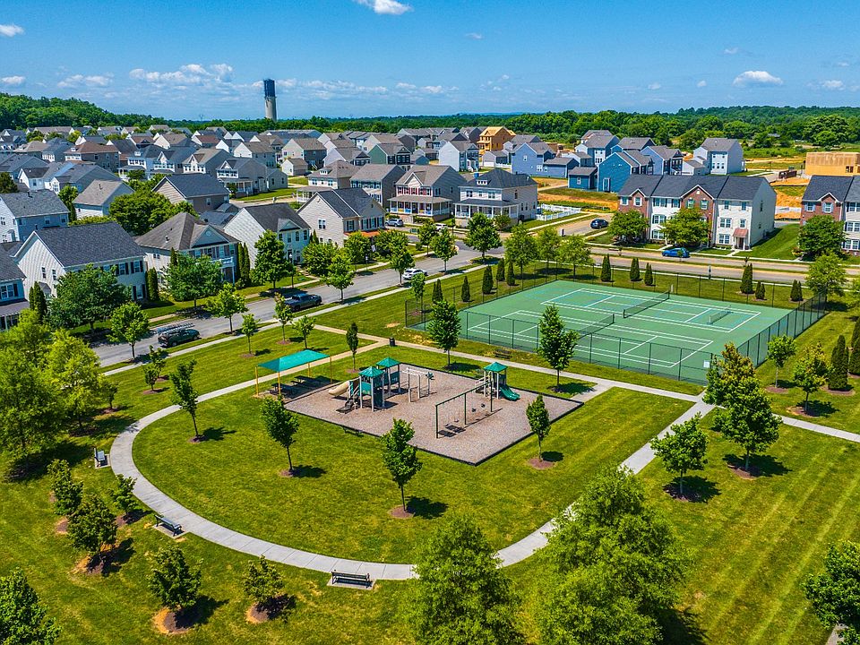 Stay active with community amenities including tennis courts and a playground at Huntfield.
