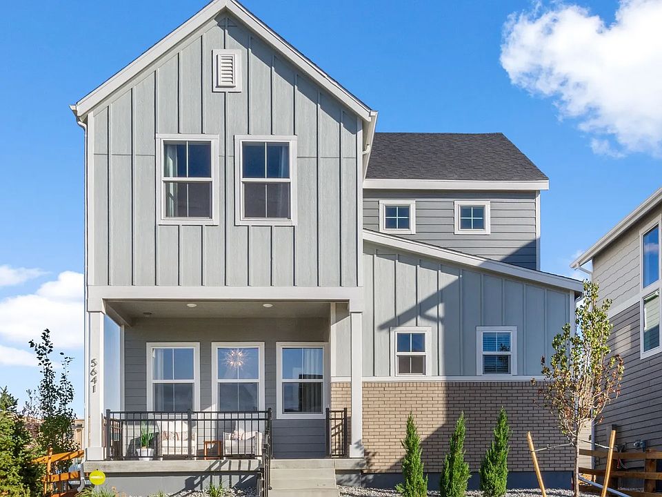 Discover elegance at Dillon Pointe with gable roofing, an inviting porch, and serene luxury living.