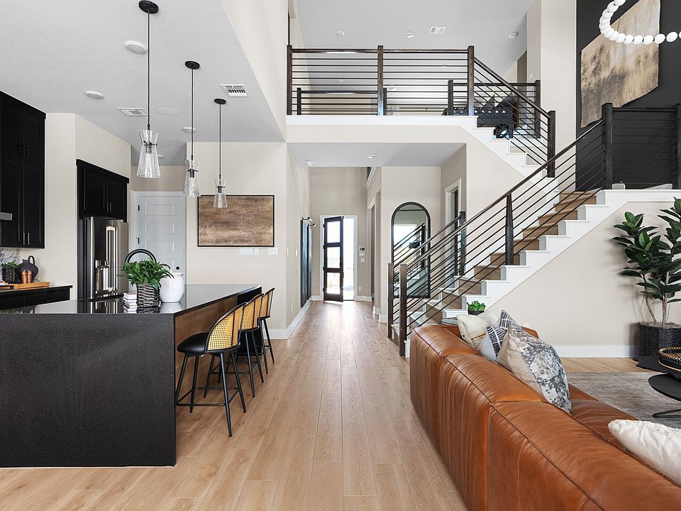 Open-concept design with vaulted ceilings