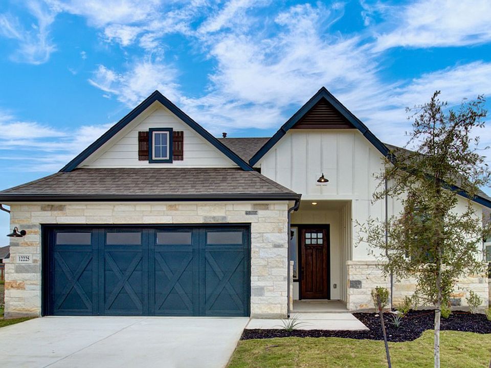Elegant stone facade and dark accents define this modern Piedmont home.