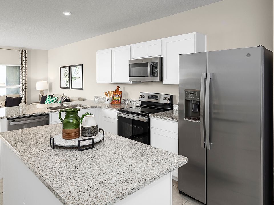 Open House Sat. and Sun. 12-2 PM. TOUR NEW TOWNHOMES WITH A GARAGE