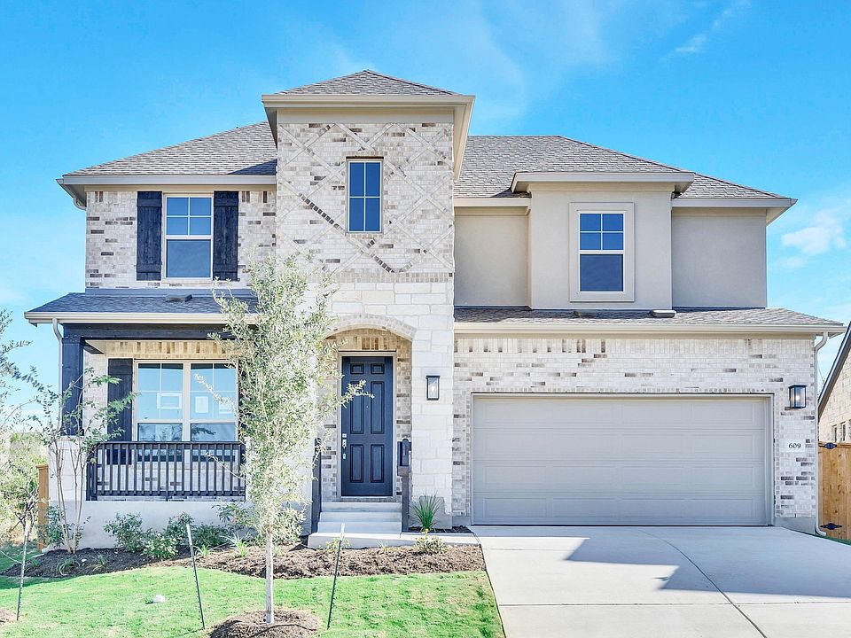 Luxurious brick facade and modern design in the exclusive Mirador community.