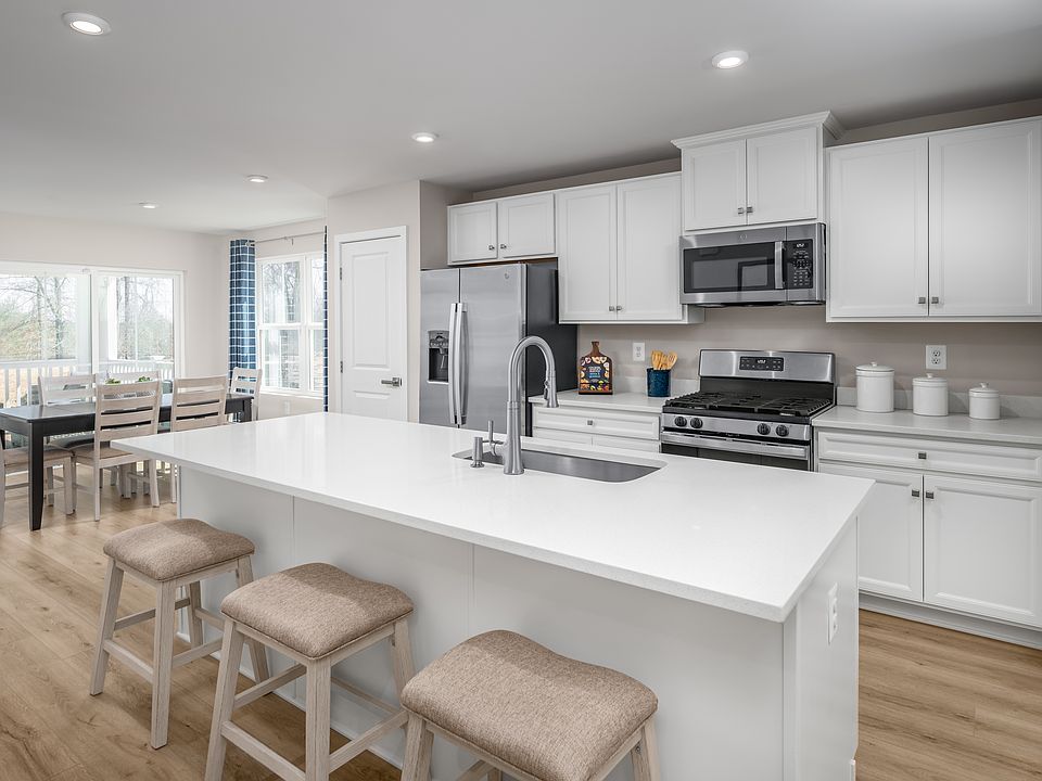 A NEW 55 COMMUNITY FEATURING FIRST-FLOOR OWNER S SUITES - DAILY OPEN HOUSE FROM 11AM - 1PM