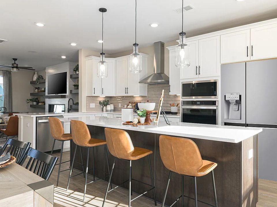 IBIS plan - open concept kitchen with quartz countertops and 42 cabinets in new homes in Moncks Cor